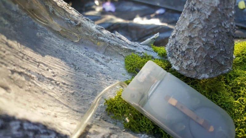Glue fairy lights to the inside front-facing side of the concrete ring light
