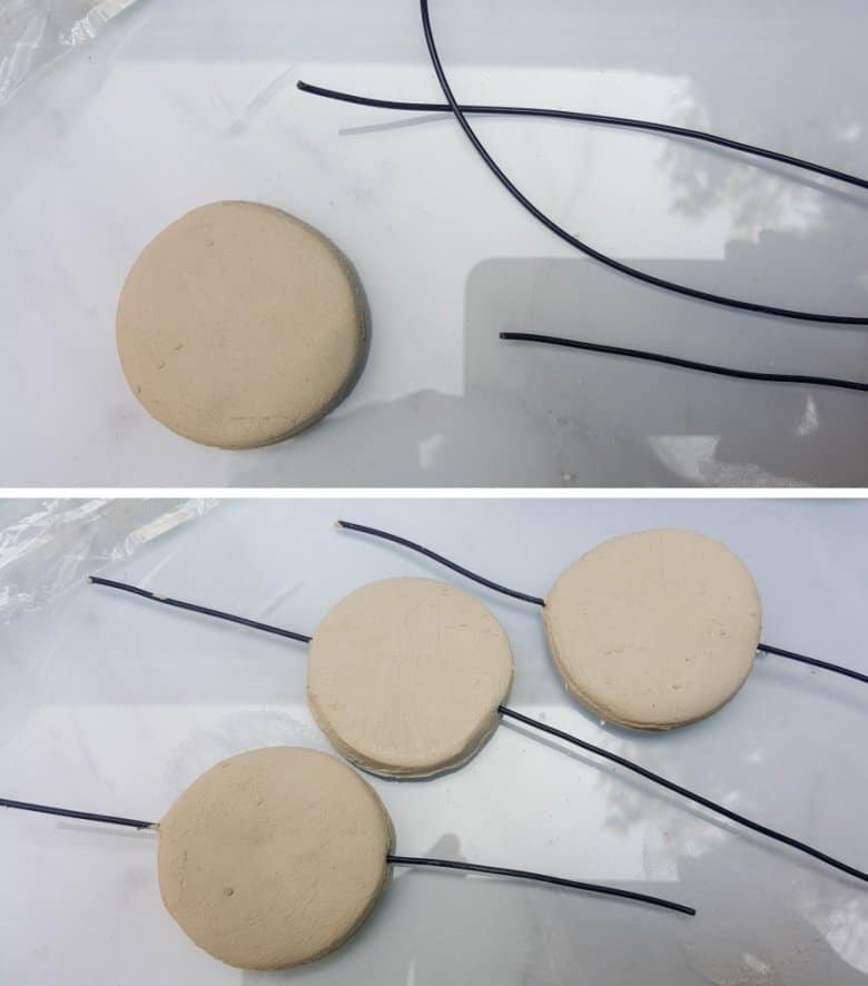Insert a piece of wire into the wet clay