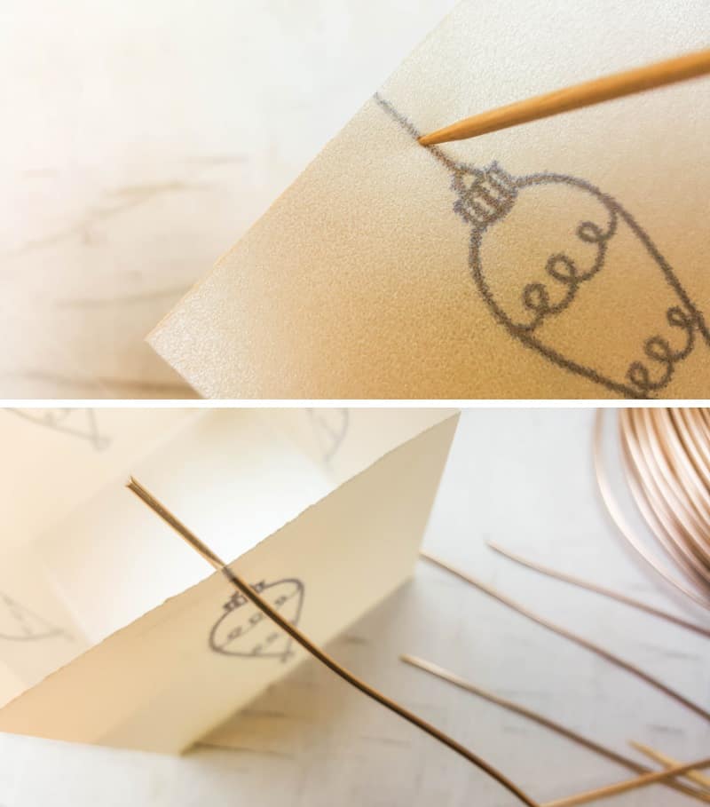 Use a toothpick to make a small hole hole on opposite sides of the box light
