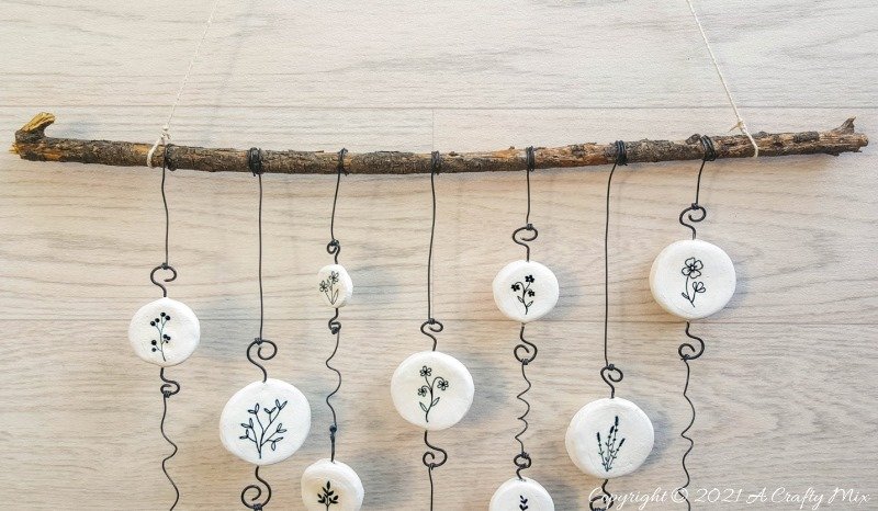 Easy budget friendly tattooed clay wall hanging that can be made in a morning. The photo rich tutorial includes free botanical printables to get you started. #WallDecor #ACraftyMix #AirDryClay