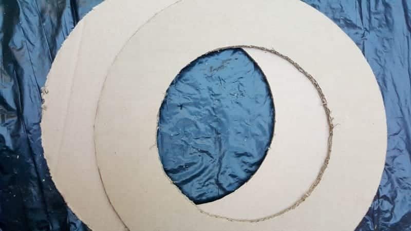 Cut the cardboard rings out with a pair of scissors or sharp craft knife