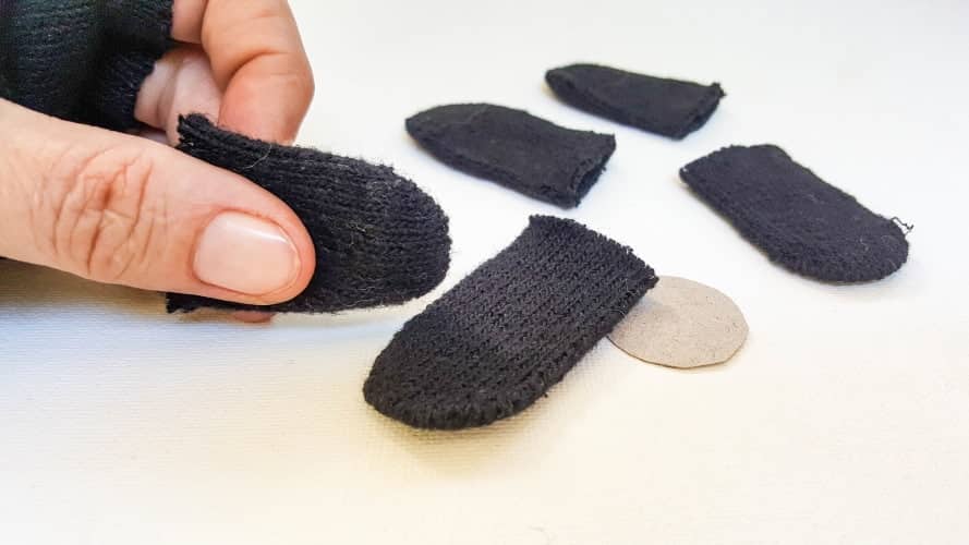 Cut the fingers off a woolen glove