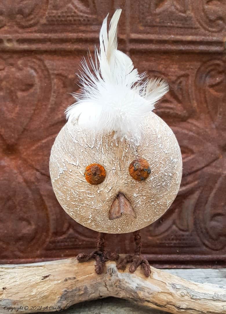 Looking for a budget-friendly craft idea? Then you'll love making this easy polystyrene ball bird with rusty detail. The tutorial will also show you how to mix up a batch of texture paste using common household items. #polystyreneballcraft #ACraftyMix #TexturePaste