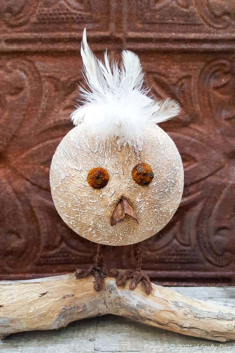 Looking for a budget-friendly craft idea? Then you'll love making this easy polystyrene ball bird with rusty detail. The tutorial will also show you how to mix up a batch of texture paste using common household items. #polystyreneballcraft #ACraftyMix #TexturePaste
