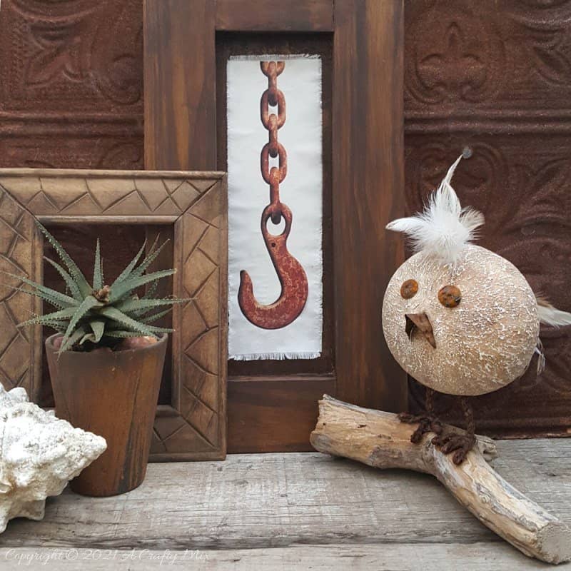 Looking for a budget-friendly craft idea? Then you'll love making this easy polystyrene ball bird with rusty detail. The tutorial will also show you how to mix up a batch of texture paste using common household items. #polystyreneballcraft #ACraftyMix #TexturePaste