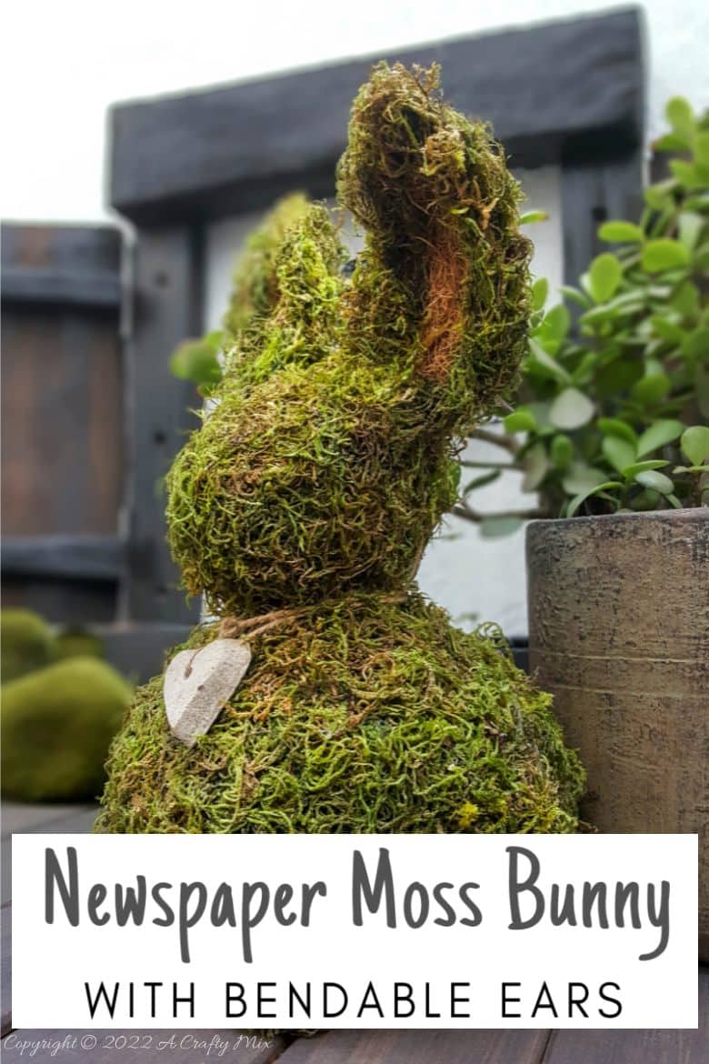 Looking for a budget-friendly craft idea to welcome Spring? We&rsquo;ll show you just how easy it is to make this adorable newspaper moss bunny, with ears that bend. She can be made in a morning and the bunny is perfect for Easter or to add a touch of whimsical greenery to your home d&eacute;cor. #MossBunny #ACraftyMix #EasterDecor