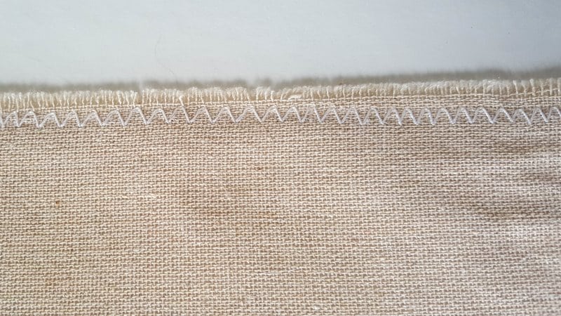 Zig-zag around the edges to print fraying