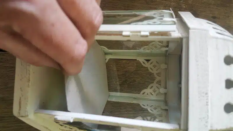 Check if the cardboard template fits snugly inside the lantern