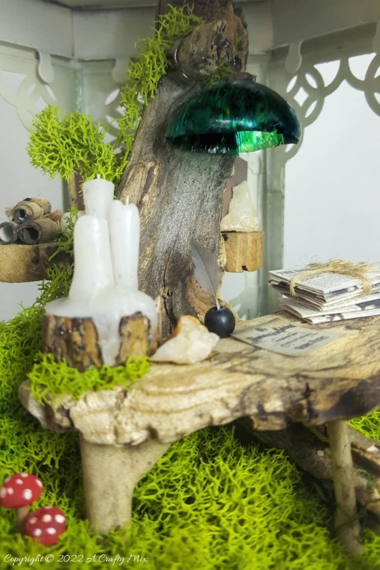 One of the reasons I love miniatures so much is how they draw the viewer in and encourage deeper scrutiny. Like this DIY pixie den lantern. It&rsquo;s filled with ancient scrolls, fairy-tale artifacts and a light that casts a magical glow over everything. Make your own with this photo-rich tutorial #FairyGarden #ACraftyMix #CraftTutorial