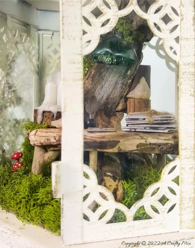 One of the reasons I love miniatures so much is how they draw the viewer in and encourage deeper scrutiny. Like this DIY pixie den lantern. It’s filled with ancient scrolls, fairy-tale artifacts and a light that casts a magical glow over everything. Make your own with this photo-rich tutorial #FairyGarden #ACraftyMix #CraftTutorial