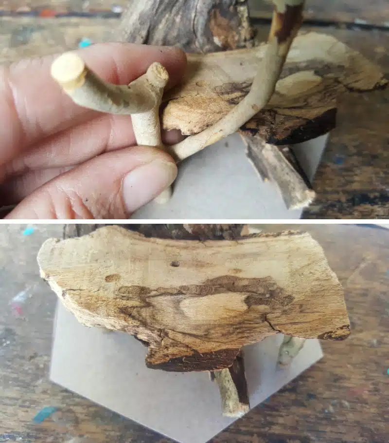 Trim smaller twigs and use them to make legs for the table
