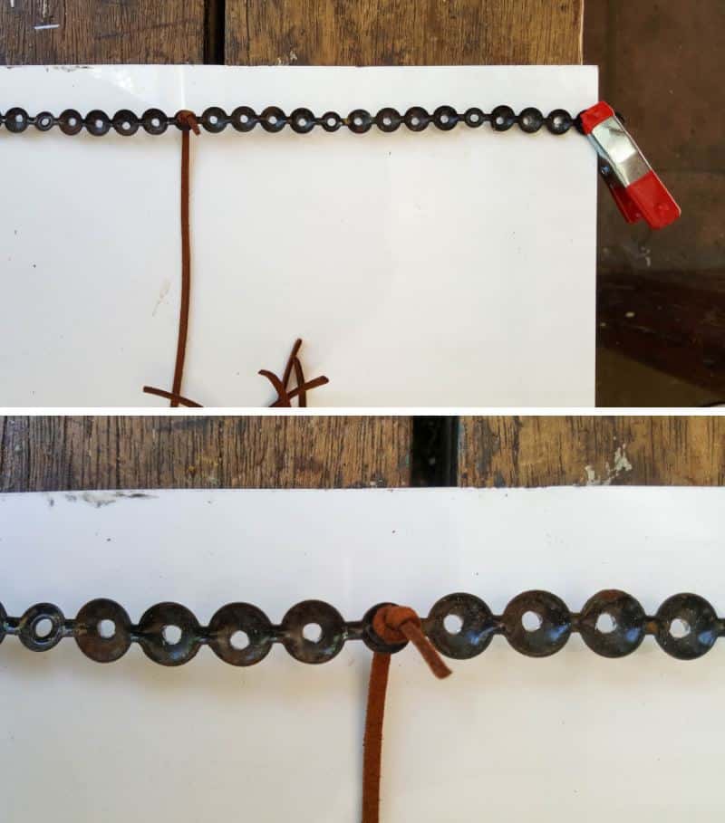 Upholstery nail strips help space the hanging feathers and beads neatly around the back of the leather pocket
