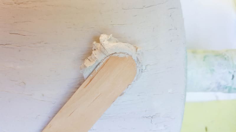 Apply the texture paste onto the bottle