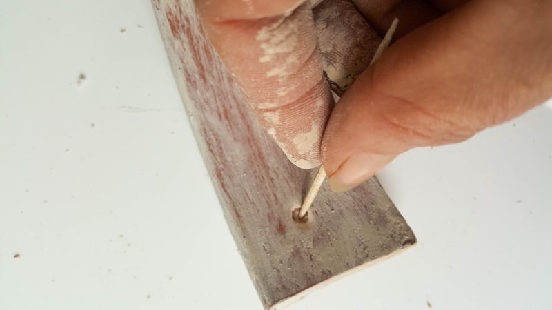Remove any excess gesso with a toothpick
