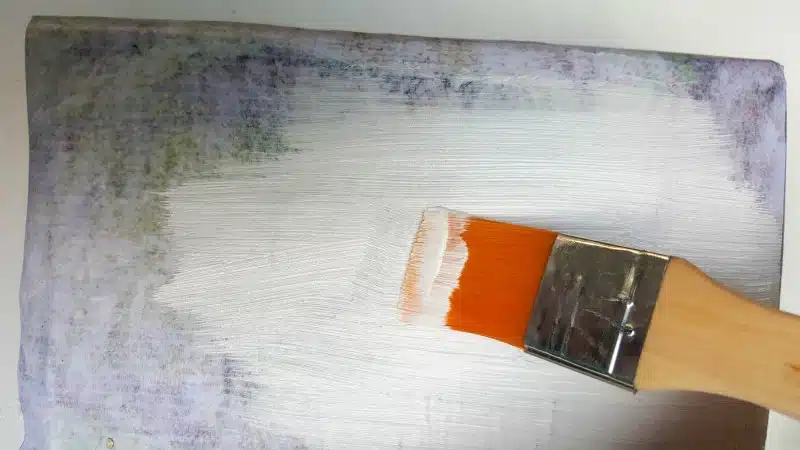 Paint over the image to seal and block out light