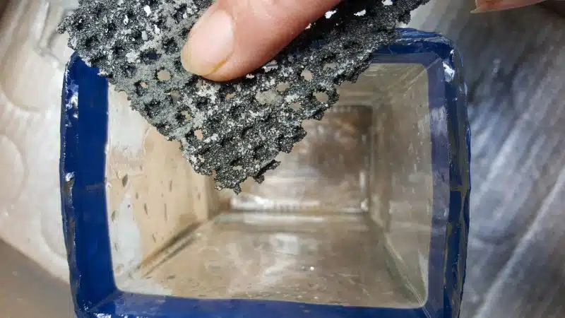 Use tile sandpaper to sand away any rough edges