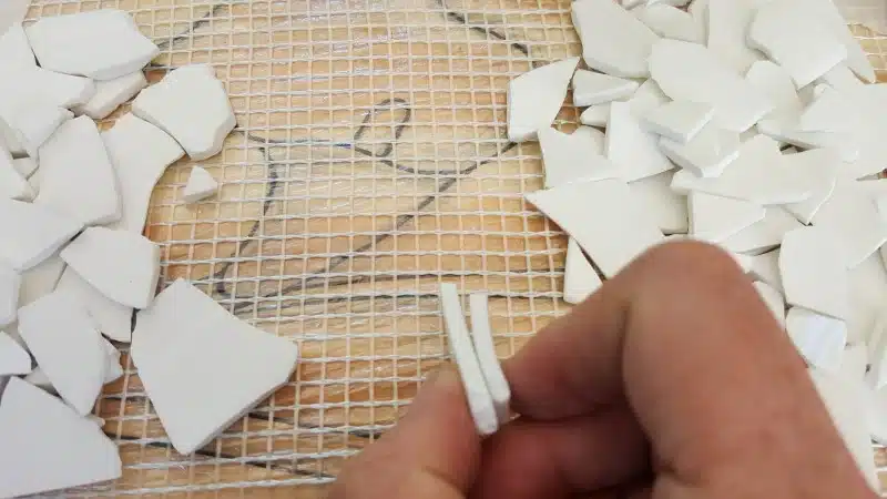 Sort the broken pieces into different thicknesses
