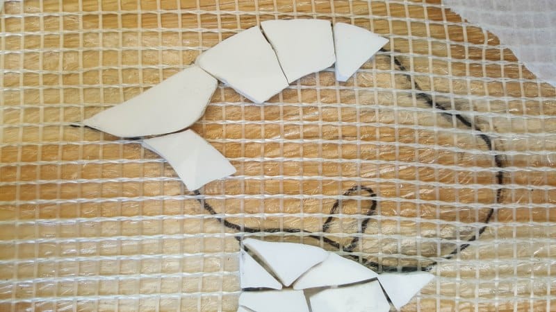 Working from the outside in, glue the shapes in place. 