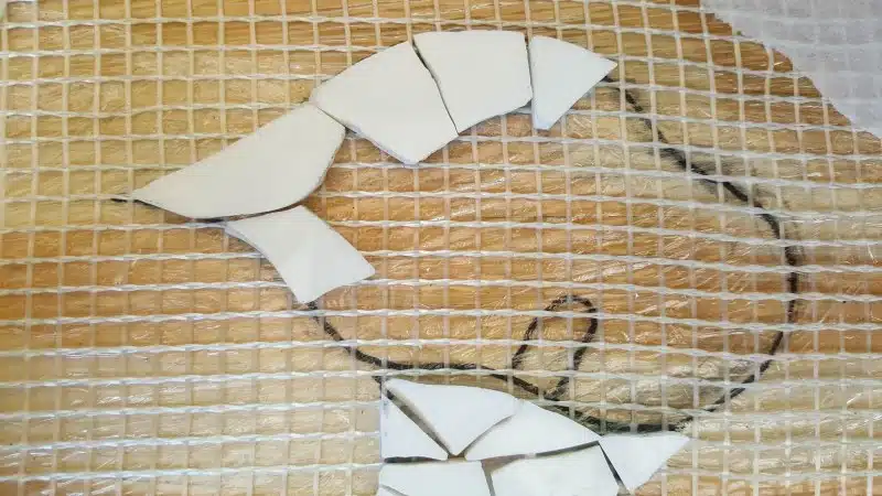 Working from the outside in, glue the shapes in place. 