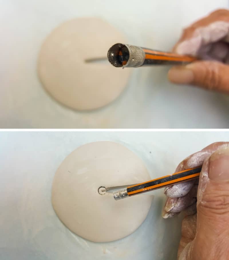 Use the back of a pencil to make a hole in the center of the clay disc