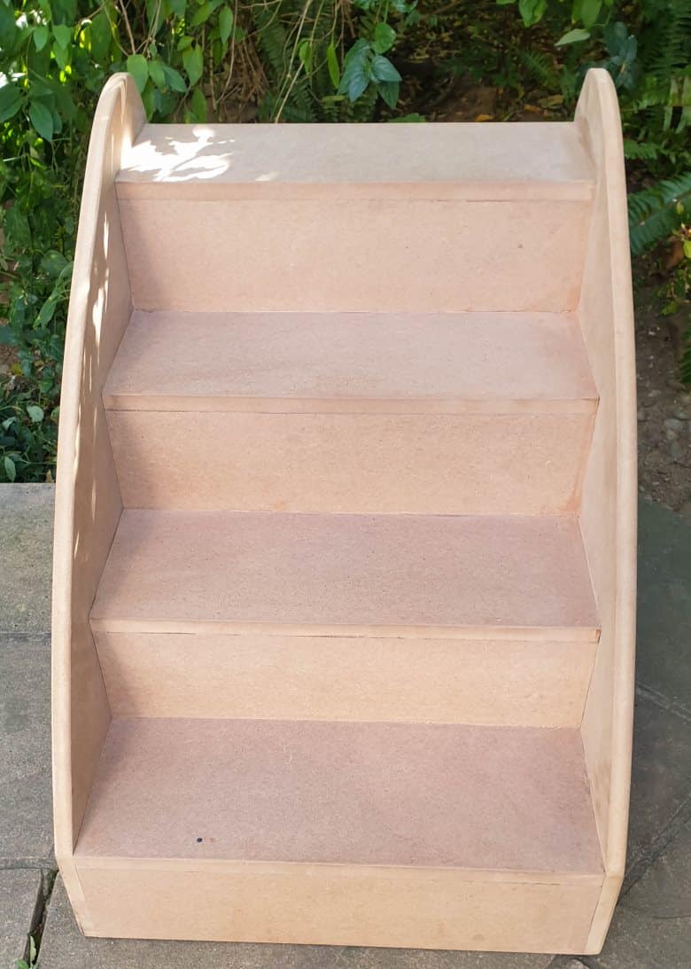 Boring wooden steps that will be transformed using rice paper and paint