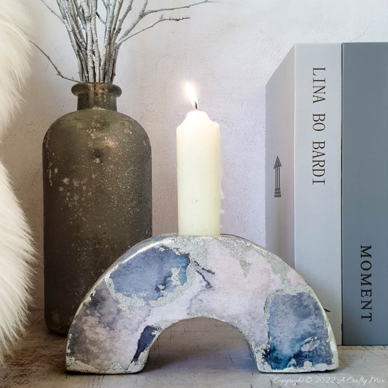 No matter your d&eacute;cor style, this easy to make concrete arch candleholder will light up the dinner table and look stunning on a window sill or bookshelf! No special tools or molds required and you can customize them to suit your unique look and vibe. #ACraftyMix