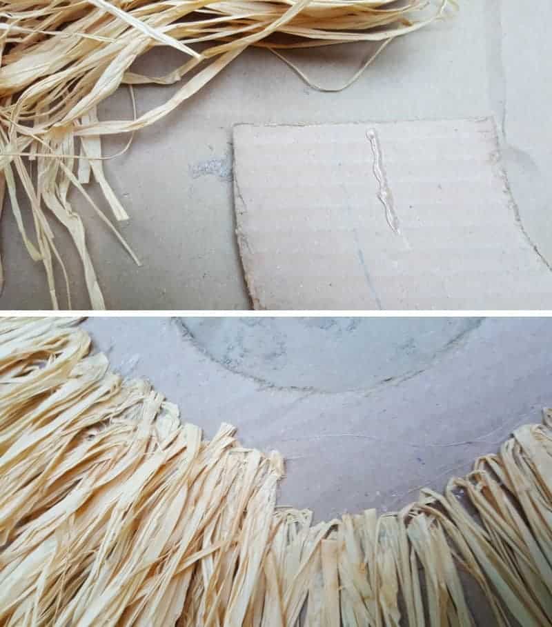 Glue the raffia on the larger thicker arch