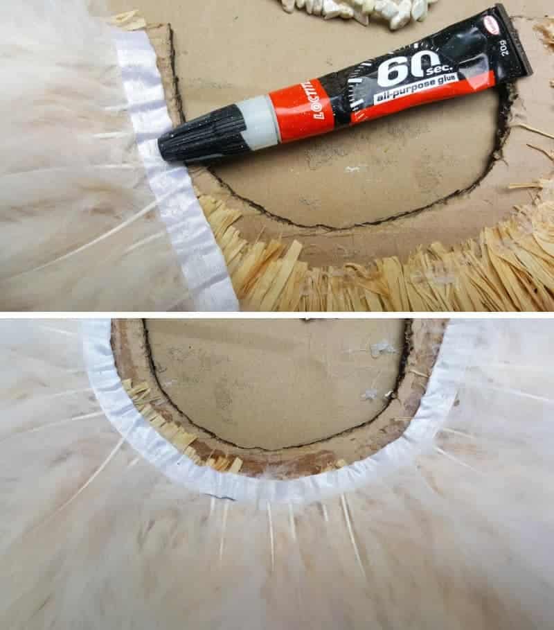 Glue the feather on the larger thicker arch