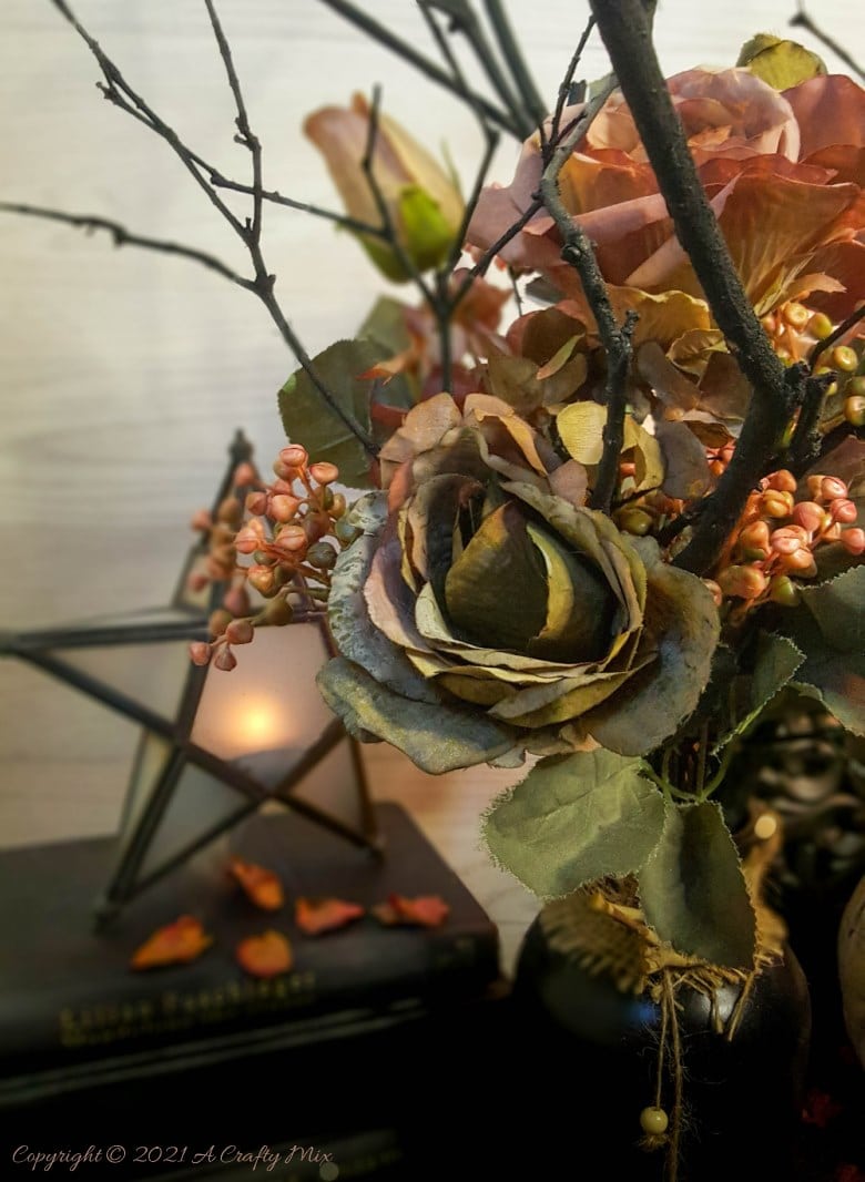 Add a not-so-creepy touch to your All Hallows' Eve Gathering with these easy-to-make Halloween place card holders. They only take a few minutes to put together and will make both your wallet and your dinner guests smile. #ACraftyMix #HalloweenDecor