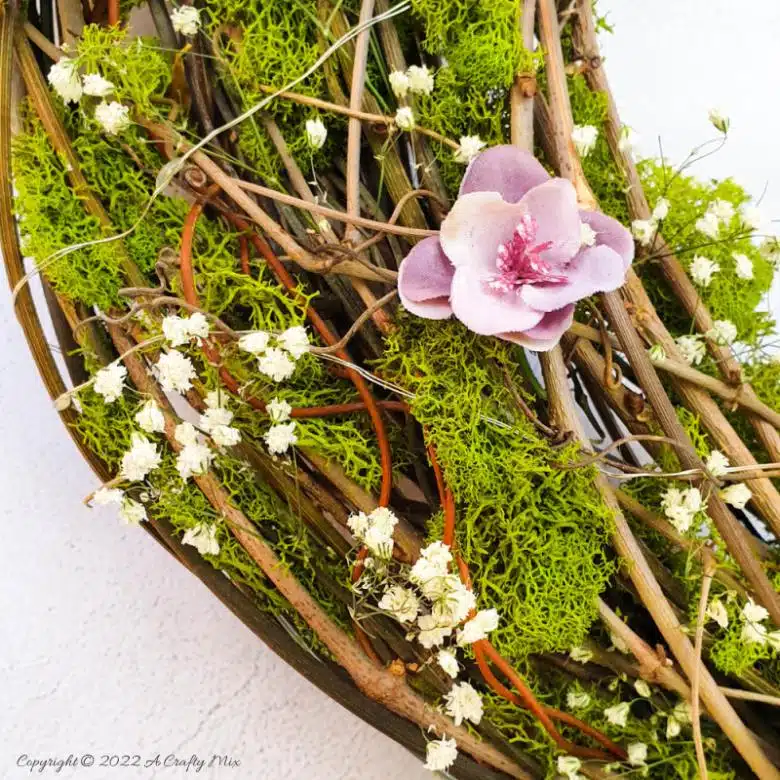 This how-to guide will show you how to make a gorgeous crescent moon wreath from scratch. It includes a step-by-step video tutorial to make fantasy-inspired curly top mushrooms. #ACraftyMix #FantasyWreath