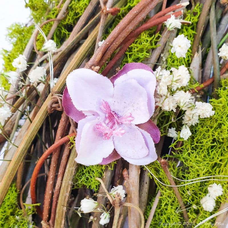 This how-to guide will show you how to make a gorgeous crescent moon wreath from scratch. It includes a step-by-step video tutorial to make fantasy-inspired curly top mushrooms. #ACraftyMix #FantasyWreath