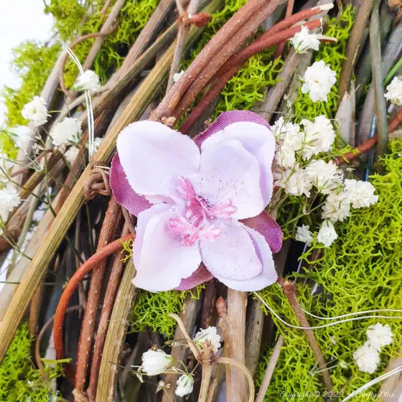 This how-to guide will show you how to make a gorgeous crescent moon wreath from scratch. It includes a step-by-step video tutorial to make fantasy-inspired curly top mushrooms. #ACraftyMix #FantasyWreath