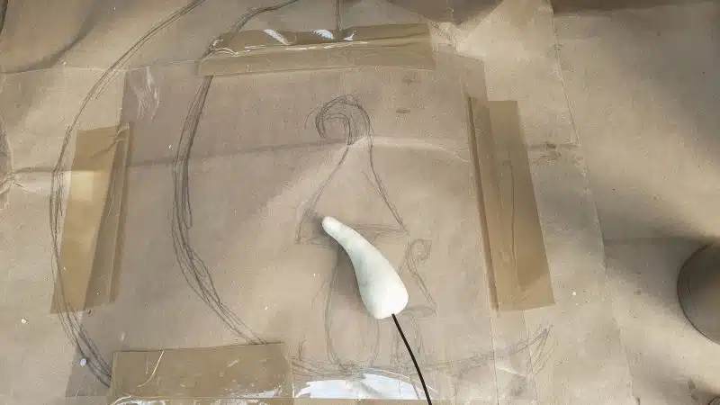 push some craft wire inside the mushroom stalks before baking or air drying so they can be attached to the crescent moon