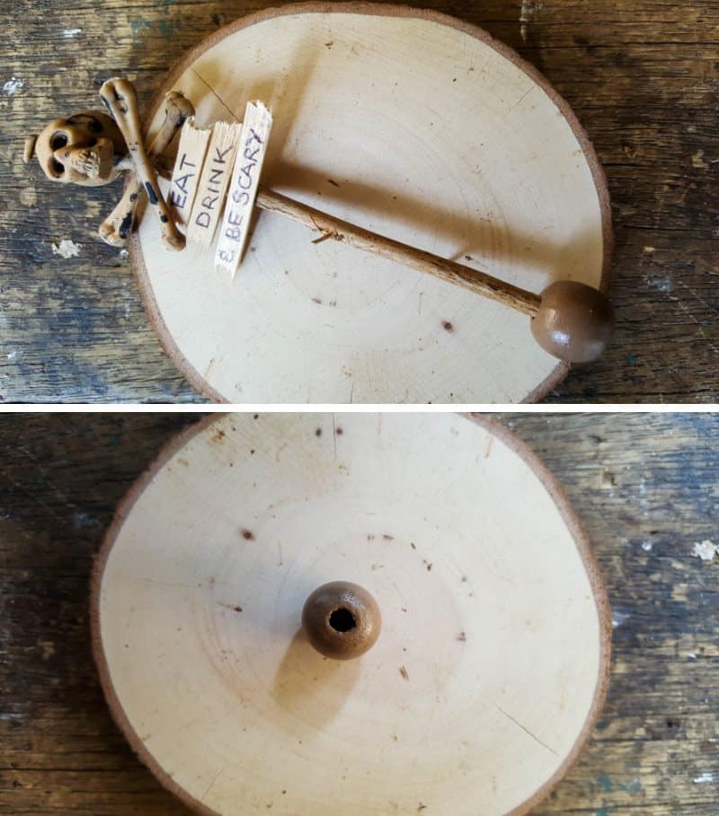 Glue a large wooden bead on the wood slice