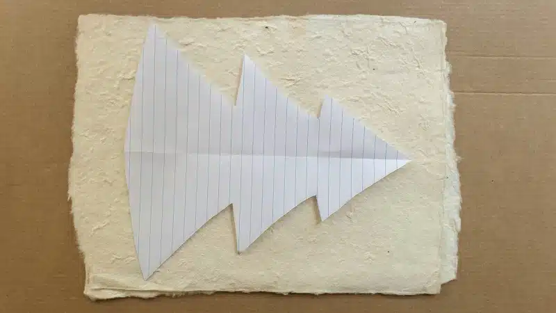 Cut out a basic Christmas tree shape