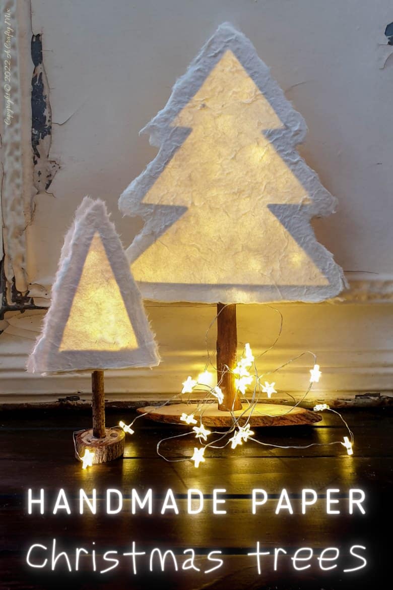 Do you want to make something that's both gorgeous and budget-friendly this festive season? If so, these easy-to-make, handmade paper Christmas trees tick all the right boxes. They look great on the mantle or a table and the lights give them a beautiful warm glow. #ACraftyMix #Tutorial