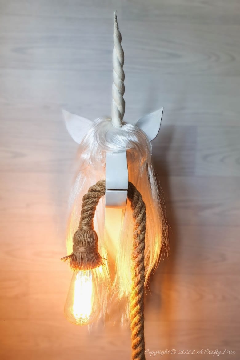 Transform your child&rsquo;s room into a whimsical wonderland with this DIY wall-mounted unicorn light. Perfect for unicorn lovers and crafty parents, this easy tutorial comes with a free printable template and step-by-step instructions. Brighten up your space with magical decor-click to get started and download your free template today.