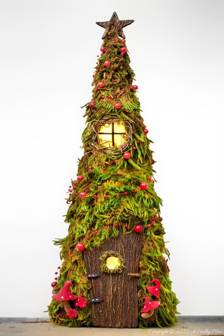 Welcome the fae folk to your festive celebrations with a Cone Fairy Christmas Tree with lights. The step-by-step tutorial will show you how to make one. #ACraftyMix