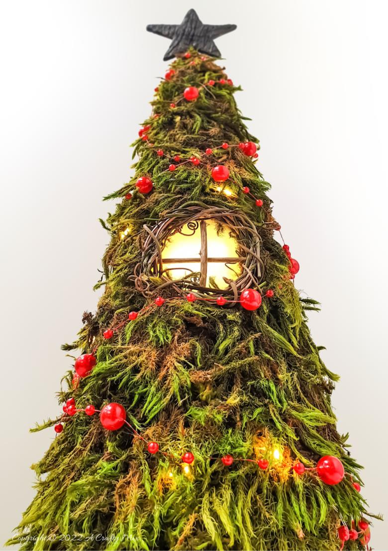 Welcome the fae folk to your festive celebrations with a Cone Fairy Christmas Tree with lights. The step-by-step tutorial will show you how to make one. #ACraftyMix