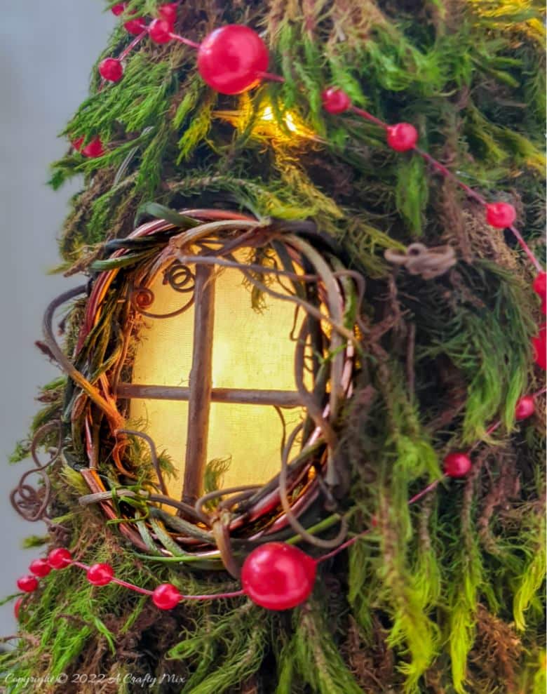 Welcome the fae folk to your festive celebrations with a Cone Fairy Christmas Tree with lights. The step-by-step tutorial will show you how to make one. #ACraftyMix