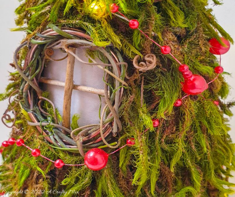 Welcome the fae folk to your festive celebrations with a Cone Fairy Christmas Tree with lights. The step-by-step tutorial will show you how to make one. #ACraftyMix