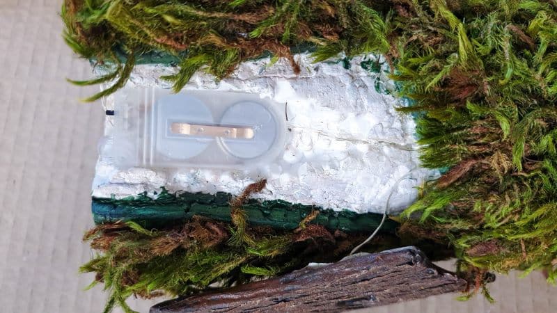 Insert the battery pack inside the door hollow