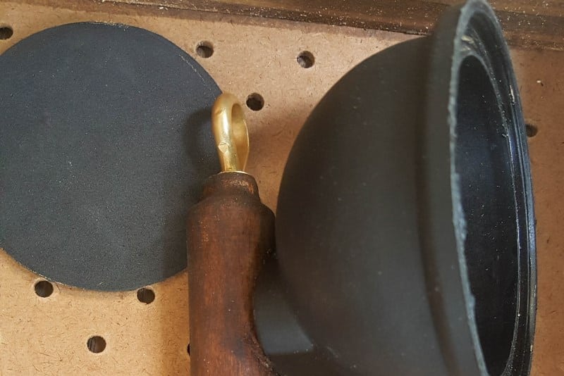 Glue the loop into the top of the cut broomstick