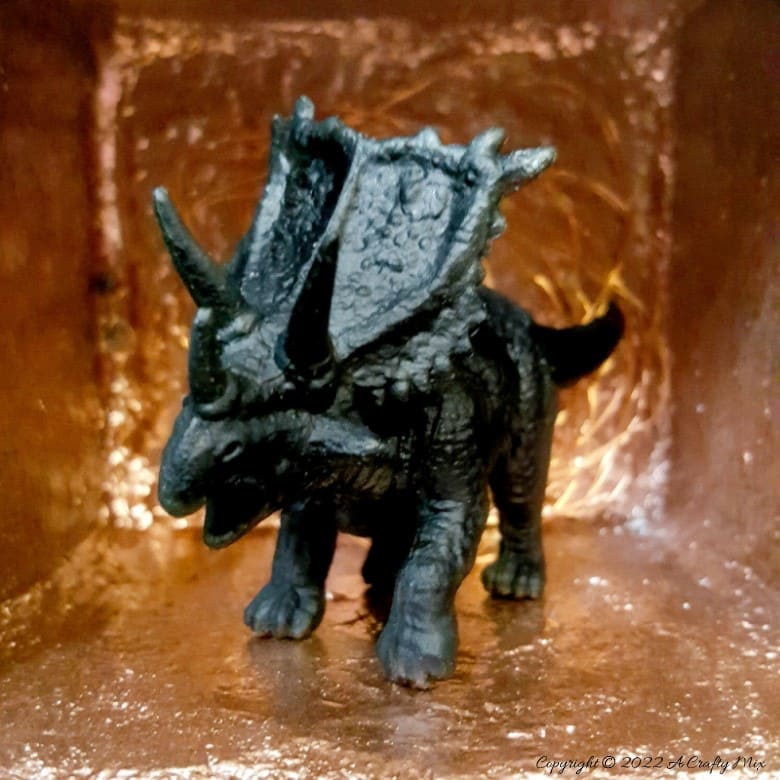 Did your son or daughter collect prehistoric creatures when they were younger? We had a whole drawer full, so when my son moved into his own apartment, I decided to repurpose those plastic toys into fun dinosaur d&eacute;cor for grown-ups. This tutorial will show you how it&rsquo;s done. #ACraftyMix
