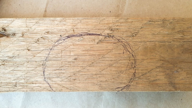 Draw a sheepish shape on a piece of scrap wood