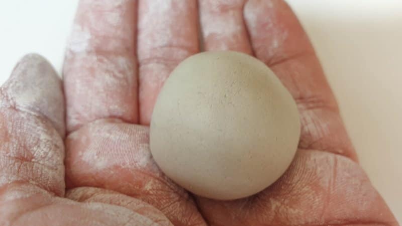 Roll the clay into a ball