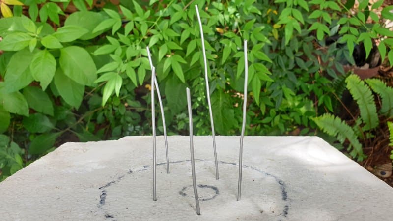Different lengths of wire stuck in polystyrene