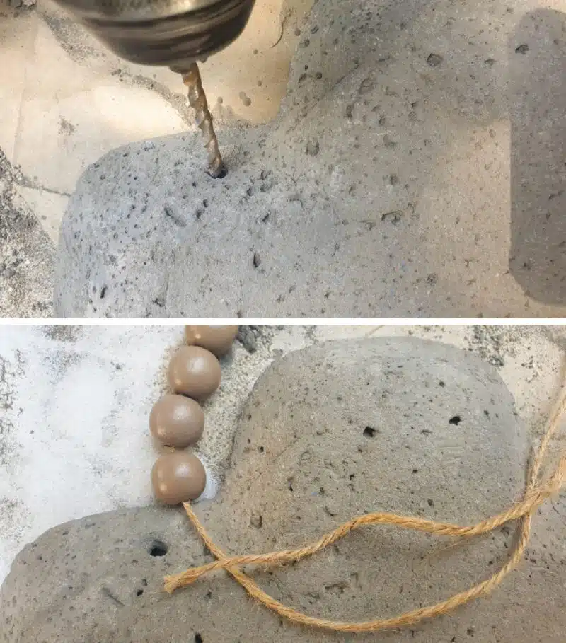 Drill two holes towards the top of the cross and hang with a beads and twine