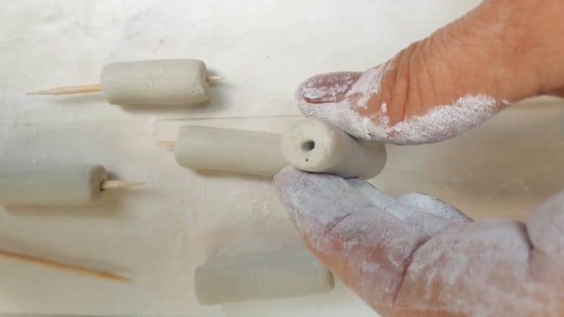 Insert a toothpick into the clay bard and leave to cure