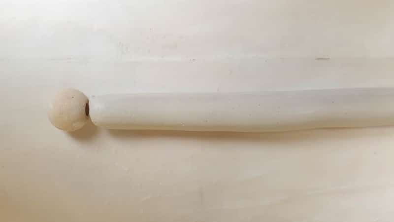 Roll the airdry clay into a worm shape